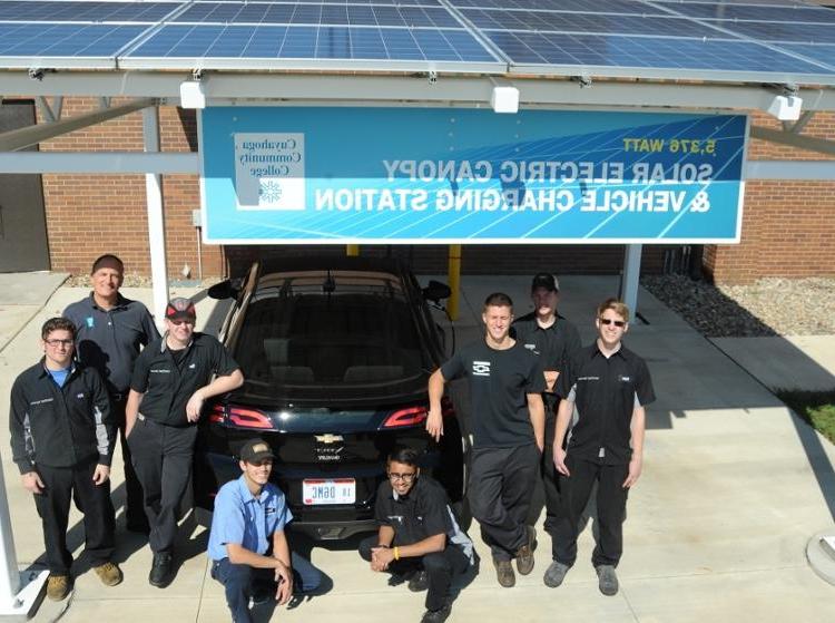 A 5.376 kilowatt solar electric array at the Advanced Automotive Technology Center at Western Campus generates approximately 6,100 kWh of clean electricity annually and shades an electric vehicle charging station.