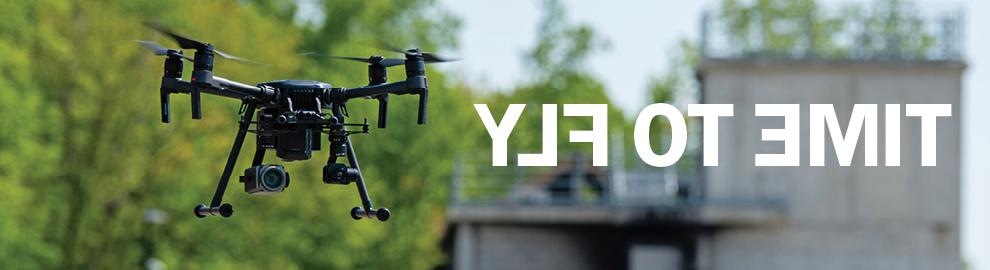 Image of drone with skyline with words Time to Fly
